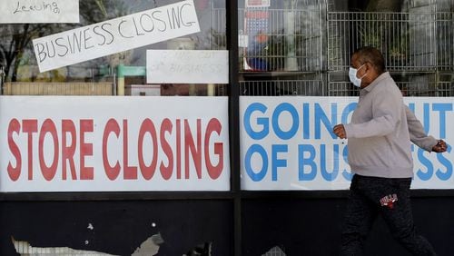 While the economy added jobs in May, many are workers going back to reopened stores and restaurants. But if consumers won’t return to spend money, those jobs may not last. (AP Photo/Nam Y. Huh, File)