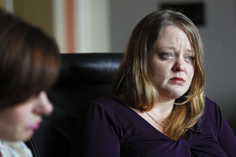 Michelle Bishop Bohanan (right), the widow of Brandon Bohanan, speaking in her lawyers office, said he texted her ‘Police are here’ and then ‘I love you’ before he was killed by police. Emelia Blehm (left), was the only witness to the fatal police shooting. Deputies were looking for someone else when they tried to arrest Bohanan on a separate charge. BOB ANDRES / BANDRES@AJC.COM
