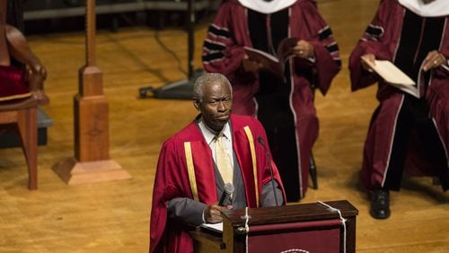 At the beginning of the service, Morehouse College’s Dean of the Chapel, the Rev. Lawrence Edward Carter Sr., starts the event with a prayer. Chad Rhym/ chad.rhym@ajc.com