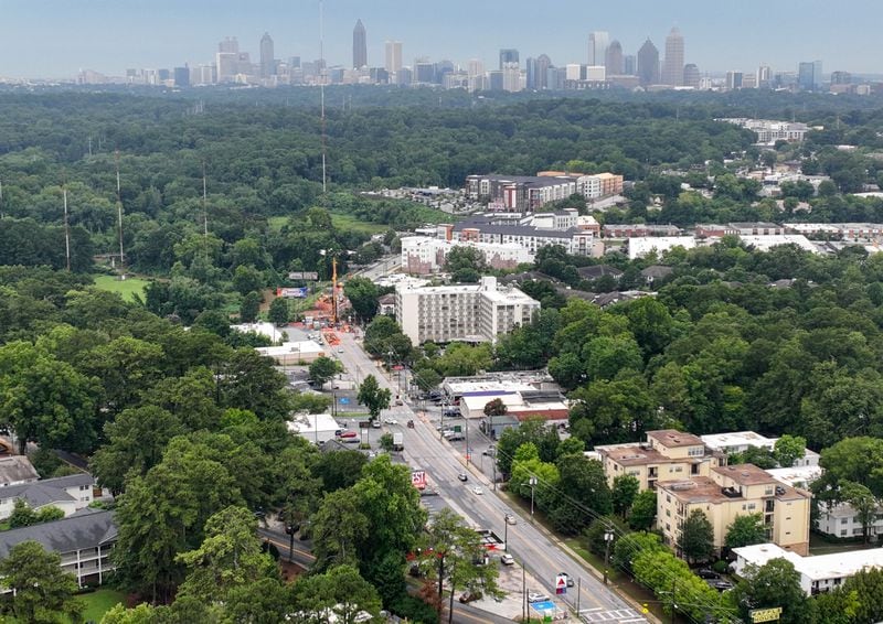 July 21, 2022 Atlanta - Aerial photograph shows construction area where the bridge along Cheshire Bridge Road, which crosses over Peachtree Creek, was demolished after the fire August 4 last year on Thursday, July 21, 2022. (Hyosub Shin / Hyosub.Shin@ajc.com)