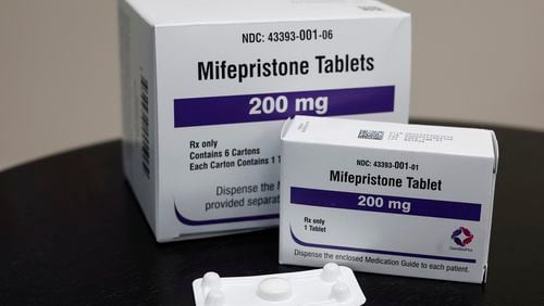 The U.S. Supreme Court this week agreed to hear a case that would limit the availability of mifepristone, the most common drug used for abortions. A decision will likely come in June, in the midst of the 2024 election. (Photo illustration by Anna Moneymaker/Getty Images/TNS)