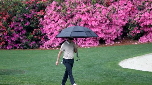 Justin Rose walk to the thirteenth green during the third round of the Masters at Augusta National Golf Club on Saturday, April 10, 2021, in Augusta. Curtis Compton/ccompton@ajc.com