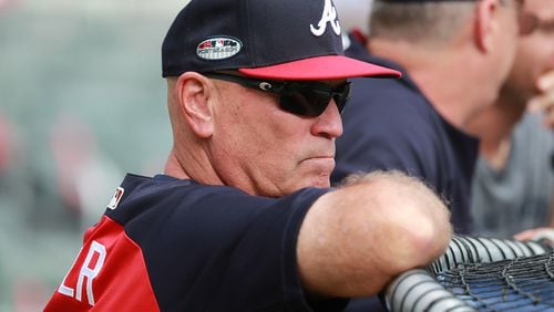 Atlanta Braves manager Brian Snitker watches his team prepare to play the Los Angeles Dodgers in Game 4 of the best-of-five National League Division Series Monday at SunTrust Park. (Curtis Compton/ccompton@ajc.com)