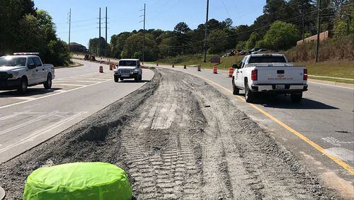 Improvements to the intersection of Bell and McGinnis Ferry roads in Johns Creek continue with the installation of curbs and gutters. CITY OF JOHNS CREEK