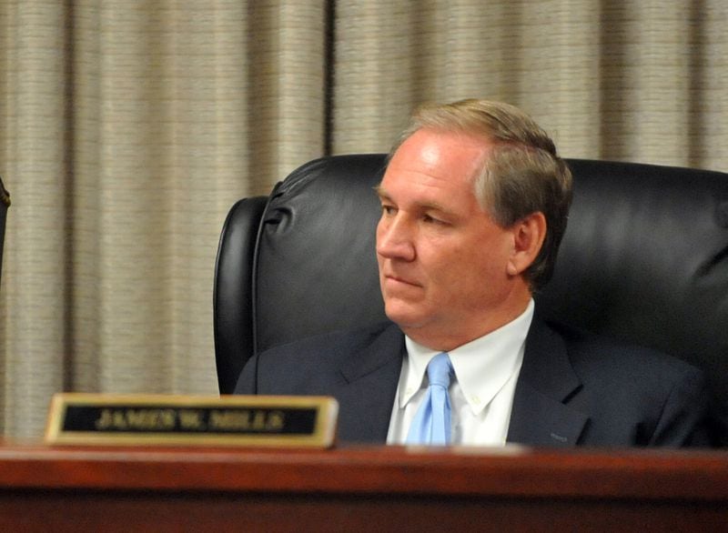 Board member James Mills during the state Board of Pardons and Paroles' monthly meeting, Tuesday, Aug. 5, 2014. KENT D. JOHNSON / KDJOHNSON@AJC.COM