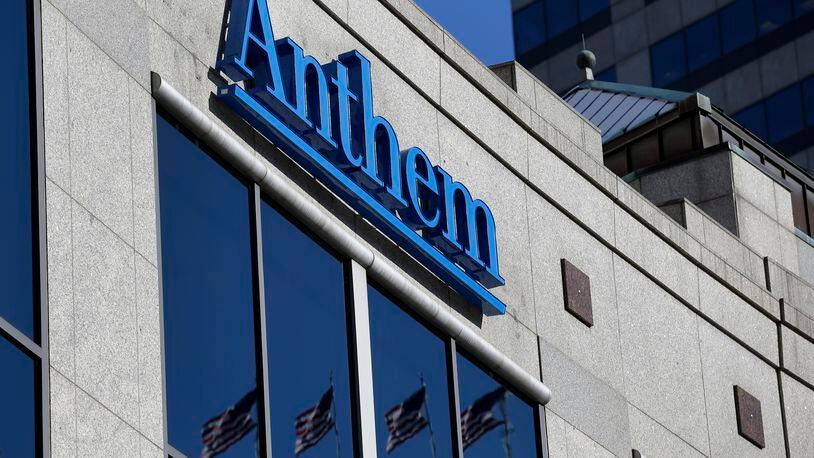 Anthem, the parent company of Blue Cross Blue Shield of Georgia, has been sued by Piedmont Hospital and five sister facilities. Shown here, the Anthem logo hangs at the health insurer’s corporate headquarters in Indianapolis. (AP Photo/Michael Conroy, File)