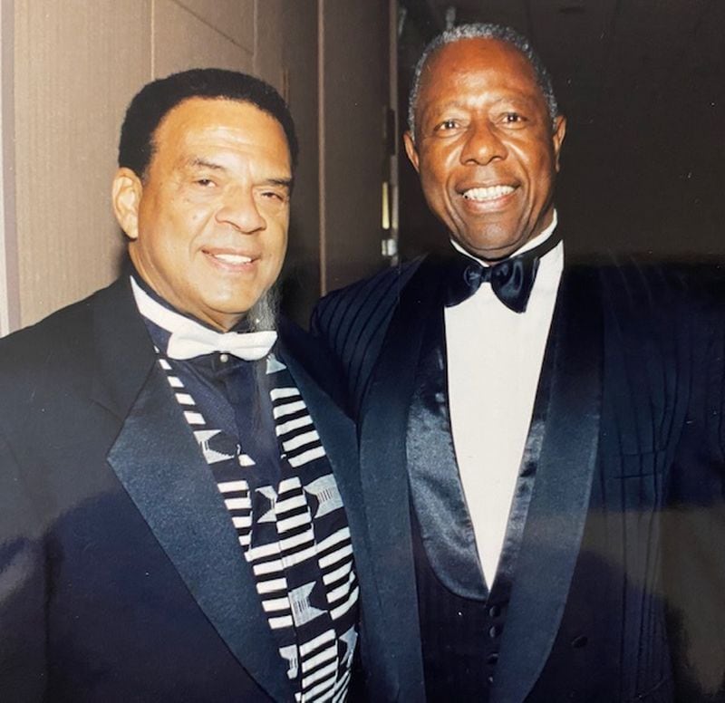 Andrew Young and Hank Aaron at a past Mayor's Masked Ball. (Courtesy of UNCF)