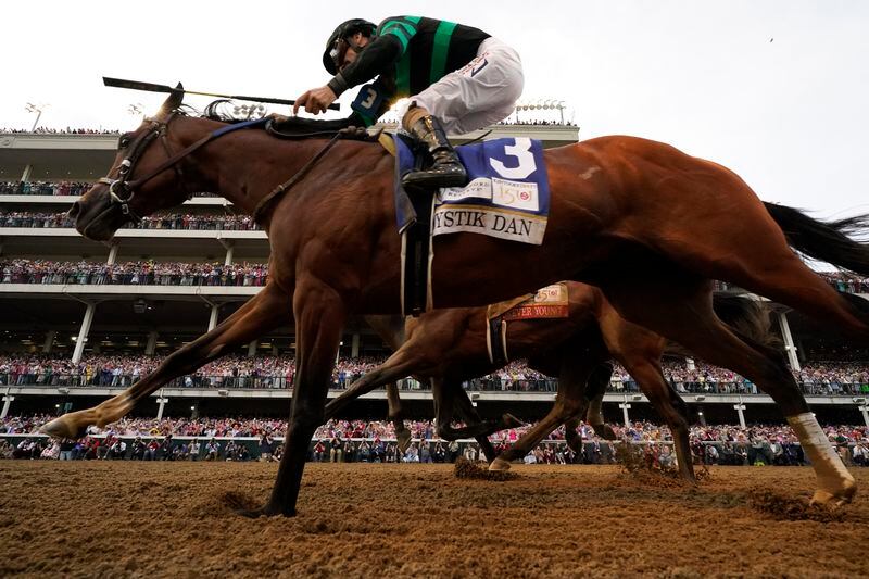 Brian Hernandez Jr. rides Mystik Dan across the finish line to win the 150th running of the Kentucky Derby horse race at Churchill Downs Saturday, May 4, 2024, in Louisville, Ky. (AP Photo/Brynn Anderson)(AP Photo/Jeff Roberson)