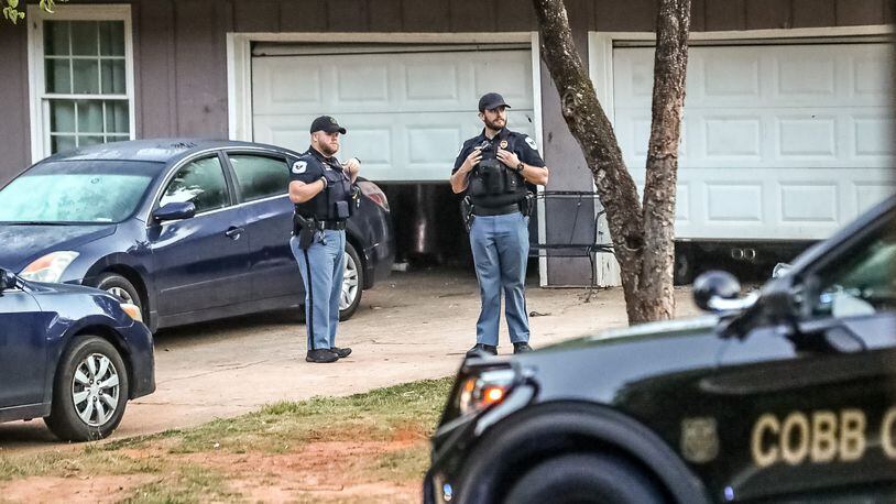 GBI agents were on the scene of a shooting Friday in Mableton involving Cobb County police. According to police, a man exchanged gunfire with officers before barricading himself inside a home on Hicks Road. He was later found dead.