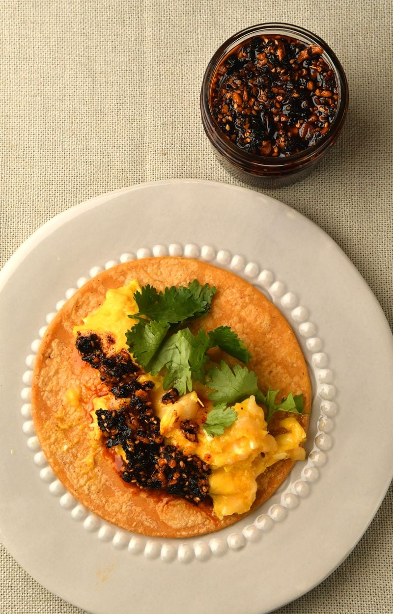 Cheesy Breakfast Tacos with Salsa Macha. (Styling by Taylor Mead / Chris Hunt for the AJC)