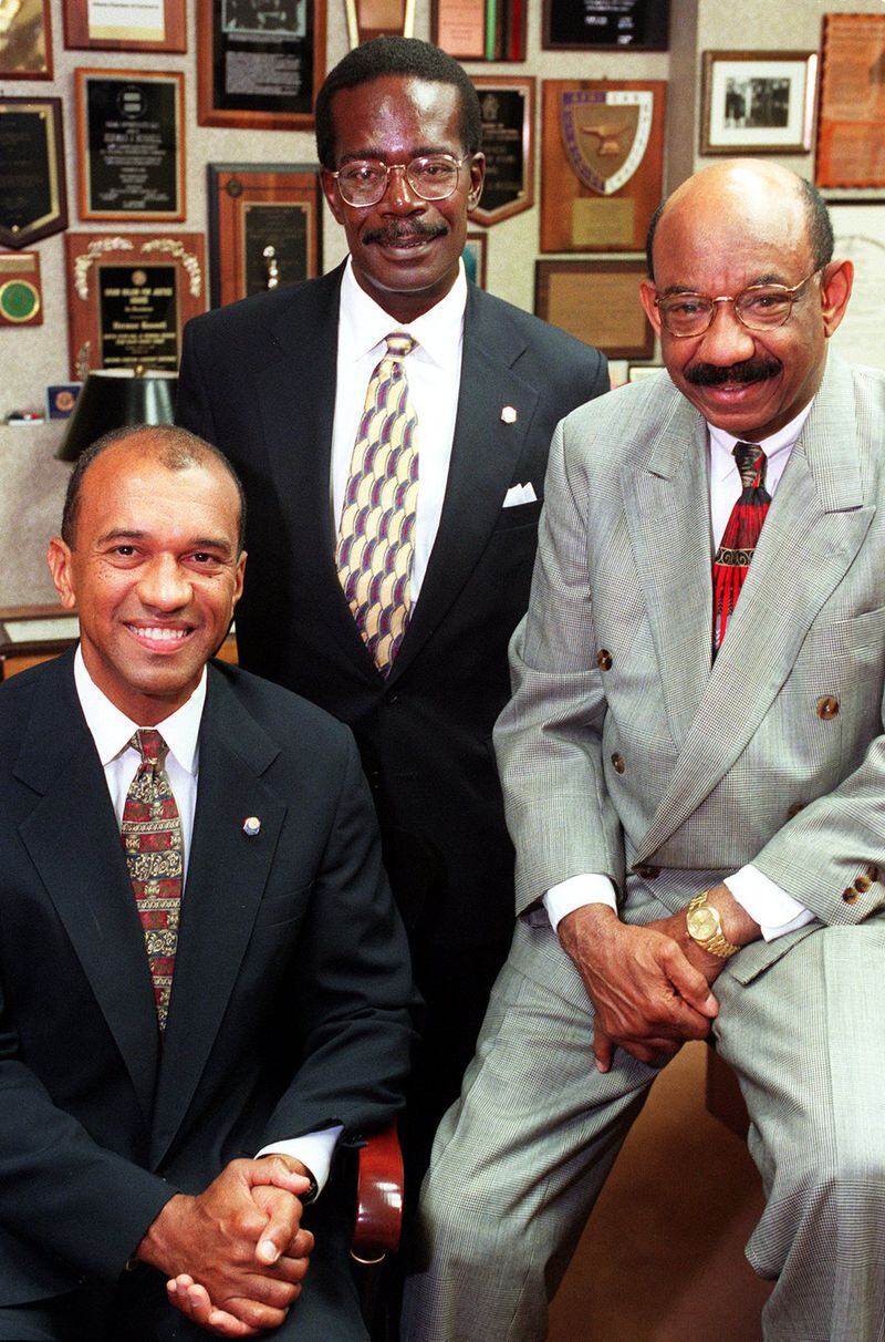 Announced in 1997, the merger of Citizens Trust Bank with First Southern created the nation’s third-largest black-owned commercial bank and brought together First Southern Chairman Gregory Baranco (left), Citizens Trust Chairman Herman J. Russell (right) and First Southern President James E. Young (center). Young became president of the expanded Citizens Trust, Russell remained as chairman, and Baranco became vice chairman. DAVID TULIS / AJC FILE PHOTO