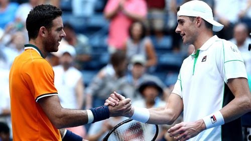 John Isner congratulates Juan Martin Del Potro following their men's singles quarterfinals match on Day 9 of the 2018 U.S. Open at the USTA Billie Jean King National Tennis Center on September 4, 2018 in the Flushing neighborhood of the Queens borough of New York City.  (Photo by Al Bello/Getty Images)