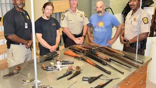 On July 23, 2017, Lt. Chuck Martin, metal artist Patrick Toups, Capt. Dan Cochran, pub owner Michael Jakob and Deputy Brandon Lewis selected the most suitable firearms collected during the buyback to be used during the iron pour.