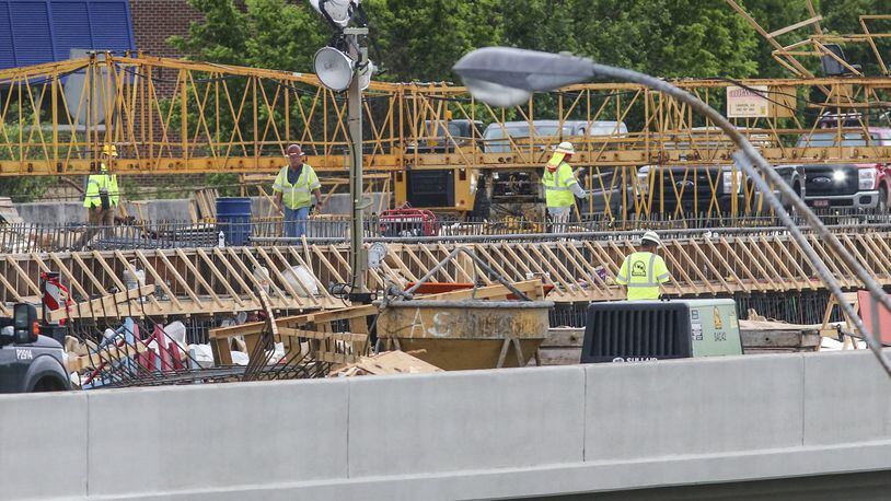 May 1, 2017 Atlanta: Work continued Monday, May 1, 2017 on the new I-85 bridge in Buckhead. Since a fire led to the collapse of a segment of I-85 in Buckhead March 30, the Georgia Department of Transportation has scrambled to reopen the vital stretch of highway into the heart of Atlanta. Contractor C.W. Matthews is rebuilding 350 feet of northbound and 350 feet of southbound lanes on I-85. JOHN SPINK/JSPINK@AJC.COM