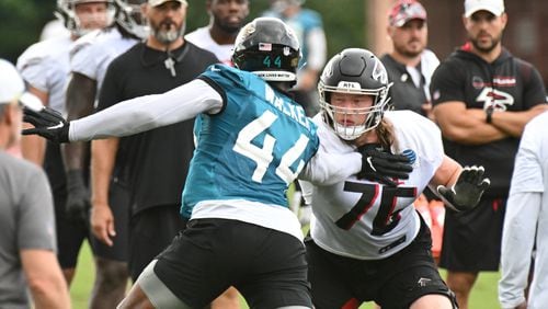 Falcons offensive tackle Kaleb McGary (76) runs against  Jacksonville Jaguars' linebacker Travon Walker (44) during a joint practice with the Jaguars at the Falcons Practice Facility in Flowery Branch on Thursday, Aug. 25, 2022. (Hyosub Shin / Hyosub.Shin@ajc.com)
