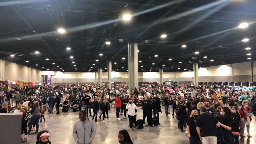 This photo, taken at about 9:30 a.m. on Feb. 13 and provided to the AJC by a cheerleading parent, shows people congregating near food trucks inside the Georgia World Congress Center during that weekend's Cheersport Nationals competition. (Special)