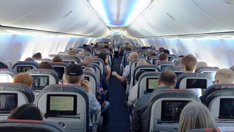One of American Airlines' new 737s. The cabin gives standard economy passengers less space, but also an entertainment system to distract them. (Josh Noel/Chicago Tribune/MCT)