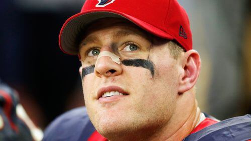 J.J. Watt of the Texans sits on the bench late in a 2014 game against the Jaguars at NRG Stadium in Houston. He and his teammates are keeping an eye on Hurricane Harvey has it heads for the east coast of Texas.
