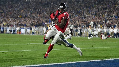 Falcons wide receiver Julio Jones catches an eight-yardtouchdown pass against the Los Angeles Rams in last week’s 26-13 victory in the NFC wild card playoff game.  The Falcons face Philadelphia in the divisional playoffs Satuday.