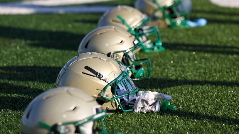 Buford football helmets are shown during warm-ups before their game against St. Frances Academy at Tom Riden Stadium, Friday, August 18, 2023, in Buford, Ga. (Jason Getz / Jason.Getz@ajc.com)