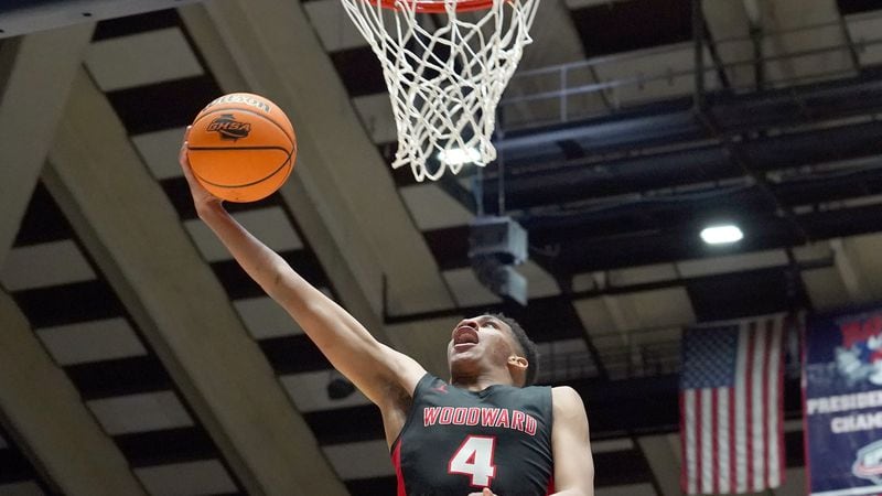 Woodward Academy's Will Richards (4) shoots a layup against Cross Creek in the second half of the Class 4A boys title basketball game Friday March 6, 2020, at the Macon Centreplex in Macon. (Tami Chappell/For the AJC)