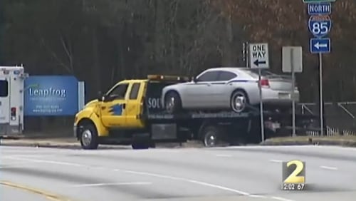 Footage from the day police discovered the bodies shows the Dodge Charger tied to the scene being towed away.