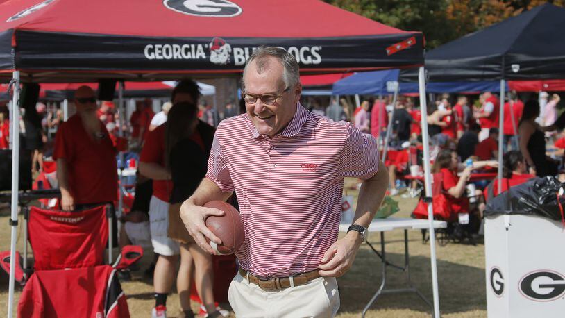 Lt. Gov. Casey Cagle caught a few footballs as he campaigned at Myers Quad before Saturday’s game at the University of Georgia. The Bulldogs’ epic season and the accompanying potential voters at the games have captured the attention of political candidates hungry for votes. Contenders are holding tailgates and rallies outside the state’s legendary gridirons. BOB ANDRES /BANDRES@AJC.COM