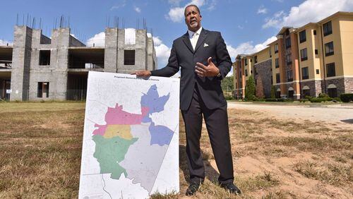 Jason Lary, the chairman for Stonecrest Yes, talks about why he believes the area should become a city at Stonecrest Mall on Oct. 4. HYOSUB SHIN / HSHIN@AJC.COM AJC File Photo