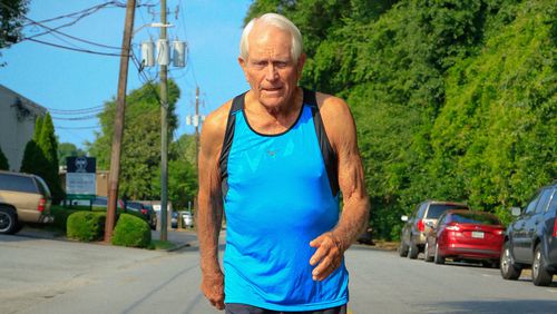 A common sight these last 50-plus years: Bill Thorn working up a sweat on some Atlanta area street. (Photo by Warren Travers/Atlanta Track Club)