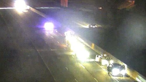 Several lanes of I-285 East were shut down at the I-75 interchange in Clayton County overnight after a police officer was rear-ended in a patrol vehicle while assisting a construction crew.