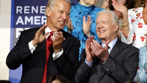 Former President Jimmy Carter (right) is seen with Democratic vice presidential candidate Sen. Joe Biden, D-Delaware, at the Democratic National Convention in Denver, Tuesday, Aug. 26, 2008. (AP Photo/Paul Sancya)