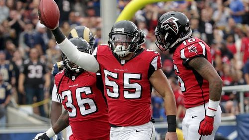 LOS ANGELES, CA - DECEMBER 11: (L-R) Kemal Ishmael #36, Paul Worrilow #55 and Justin Hardy #16 of the Atlanta Falcons celebrate Worrilow’s fumble recovery on the opening kick off in the first quarter at Los Angeles Memorial Coliseum on December 11, 2016 in Los Angeles, California. (Photo by Jeff Gross/Getty Images)