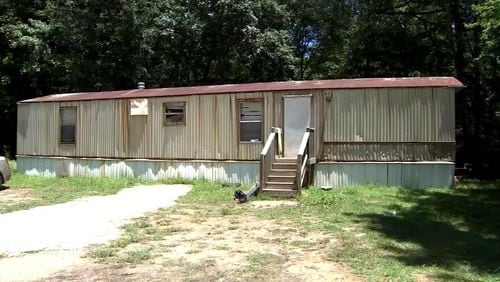 A Gainesville man is dead after someone shot him in the head outside this Gainesville home about 2 a.m. Monday, officials said. (Credit: Channel 2 Action News)