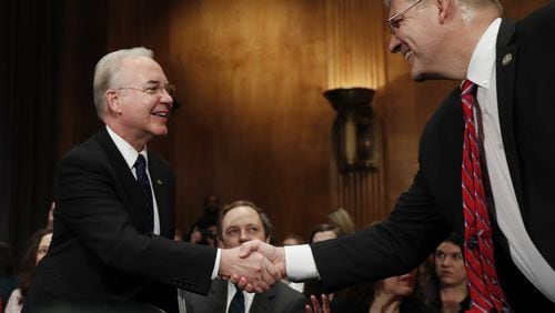 Tom Price, left, is greeted on Capitol Hill in Washington on Jan. 18, 2017, by Rep. Barry Loudermilk, R-Ga., prior to testifying at Price’s confirmation hearing as Health and Human Services Secretary before the Senate Health, Education, Labor and Pensions Committee. (AP Photo/Carolyn Kaster)