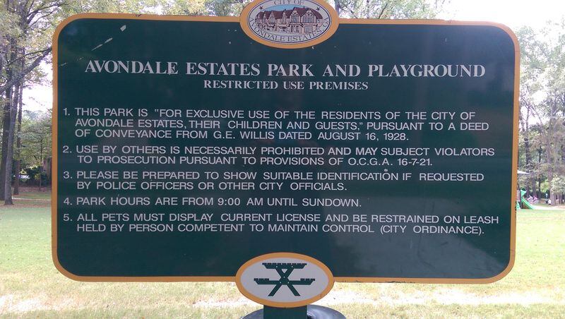 OLD SIGN: This rules marker at Avondale Estates’ Willis Park was revised. The wording relating to exclusivity, “restricted use” and “prosecution” was rewritten. (Photo courtesy of Jonathan Elmore)