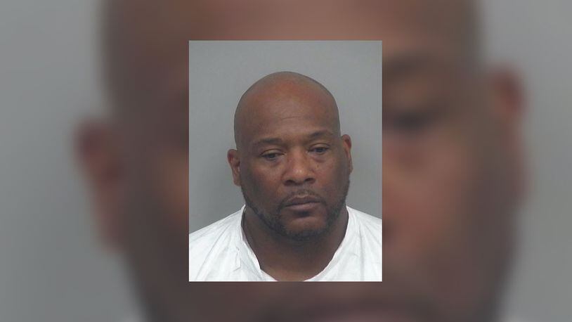 Andre King, 49, of Lilburn, was arrested on a murder charge after Gwinnett County police found a woman with a fatal gunshot wound near King's home, officials said. Her shooting death was one of two investigated by Gwinnett police over the weekend.