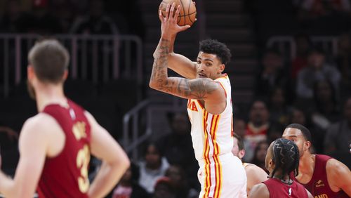 Atlanta Hawks forward Miles Norris (0) grabs a rebound during the second half against the Cleveland Cavaliers of a NBA preseason game at State Farm Arena, Tuesday, October 10, 2023, in Atlanta. The Hawks won 108-107. (Jason Getz / Jason.Getz@ajc.com)