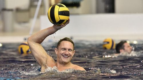 Jon Valentine, director of the Rainbow Trout water-polo team, prepares to throw during Rainbow Trout practice at Georgia Tech's McAuley Aquatic Center on Tuesday, August 20, 2019. The Atlanta Rainbow Trout water polo team was founded in 1998 in anticipation of the 1999 International Gay and Lesbian Aquatics (IGLA) Championships hosted by the Trout in Atlanta. (Hyosub Shin / Hyosub.Shin@ajc.com)