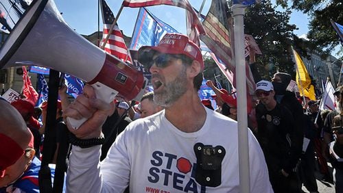 November 21, 2020 Atlanta - Pro-Trump protesters, some with flags and signs, attend a rally against the results of the U.S. presidential election outside the Georgia State Capitol on Saturday, November 21, 2020. Several different groups converged at the Capitol for a rally to show support for and against President Donald Trump. (Photo: Hyosub Shin / Hyosub.Shin@ajc.com)