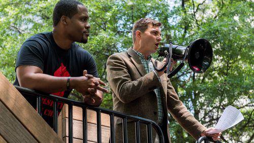 Bryan Long (right), executive director of Better Georgia, speaks during the "die-in" protest at Woodruff Park in Atlanta in 2017. Cory Hancock/AJC file