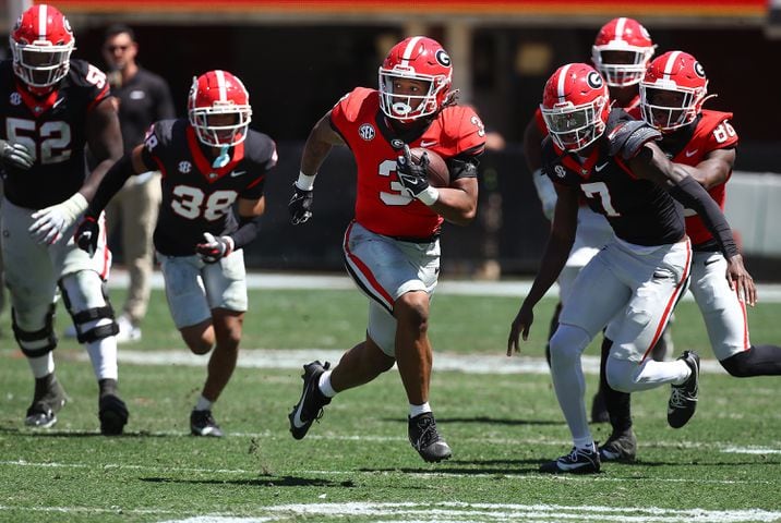 Georgia running back Andrew Paul breaks away for yardage during the G-Day game on Saturday, April 13, 2024.  Curtis Compton for the Atlanta Journal Constitution