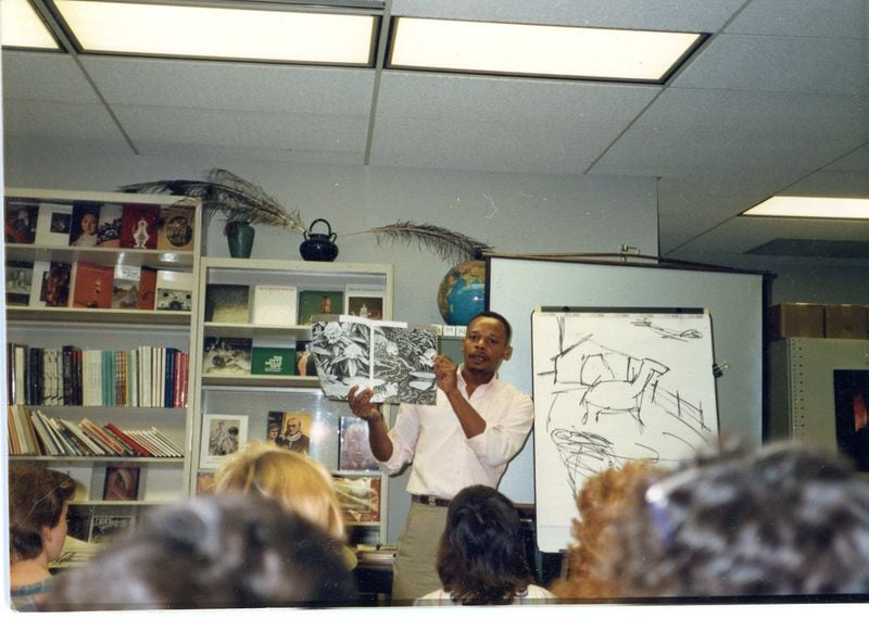“Mufaro’s” author John Steptoe presents his artwork to students. (Photo courtesy of Bweela Steptoe)