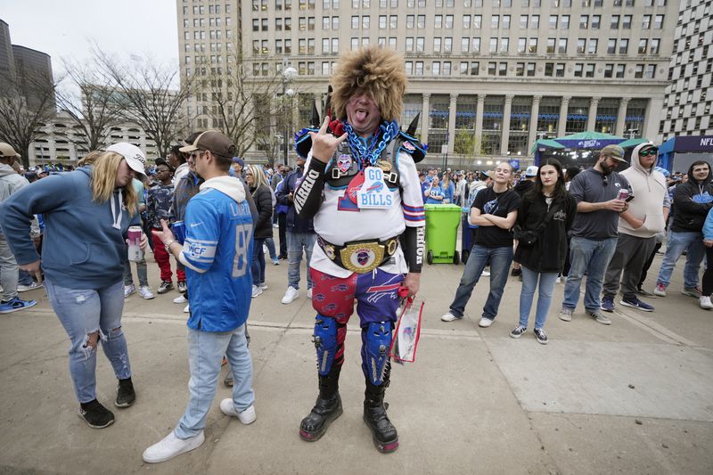 Larry Kordosky of Arizona attends the second round of the NFL football draft, Friday, April 26, 2024, in Detroit. (AP Photo/Carlos Osorio)