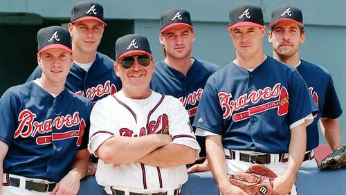 Braves pitching coach Leo Mazzone is surrounded by pitchers (clockwise from left) Tom Glavine, Steve Avery, Kent Mercker, John Smoltz and Greg Maddux. (From the files of the Atlanta Journal-Constitution)