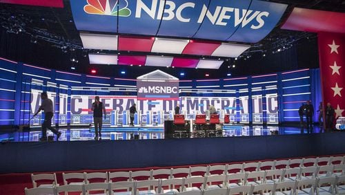Crews continue to work on the final touches of the debate stage a day before the televised MSNBC/The Washington Post Democratic Presidential debate inside the Oprah Winfrey Soundstage at Tyler Perry Studios in Atlanta. (Alyssa Pointer/Atlanta Journal Constitution)