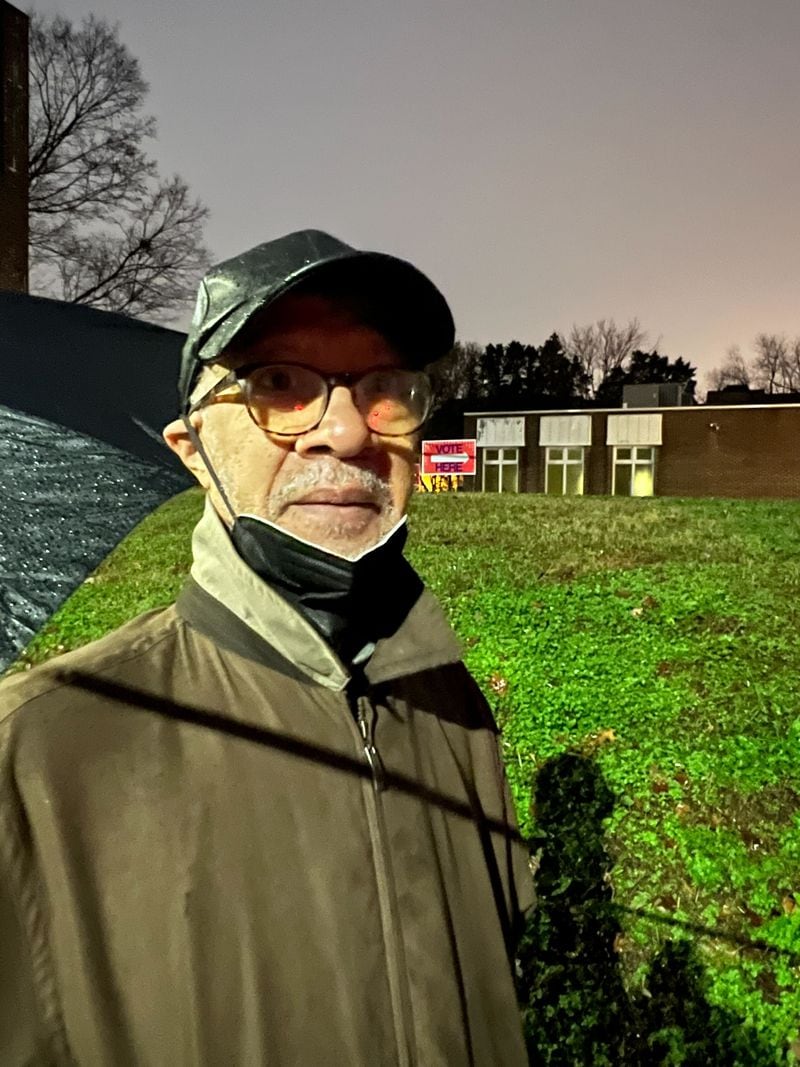 Douglas Jackson was in line before 7 a.m. to vote at Butler Street Baptist Church on Tuesday, Dec. 6, 2022.