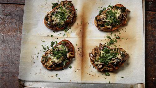 Toasted slices of rye hold sauteed mushrooms and poblanos, glazed with cream and topped with melted cheese. (E. Jason Wambsgans/Chicago Tribune/TNS)