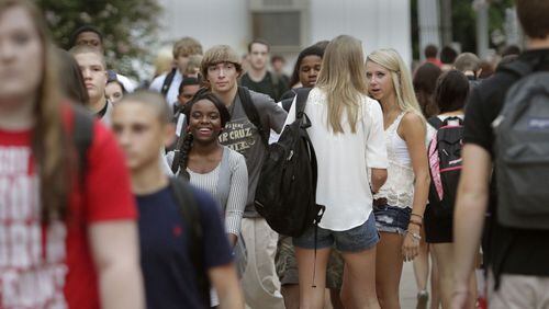 August 6, 2012 - Students stream through North Gwinnett High School during a class break on the first day of school.