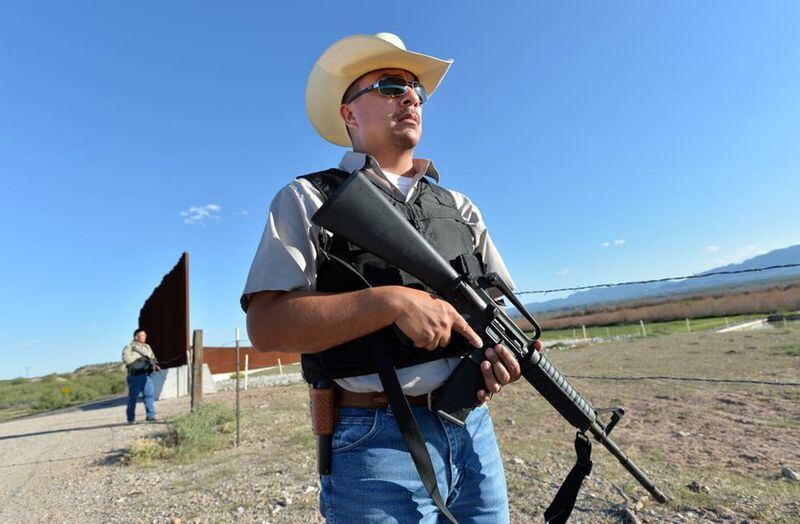 Sierra Blanca, Texas - Hudspeth County Sheriff deputies Victor Lopez (foreground) and Paul Woo (background) patrol at the border with Mexico in Hudspeth County. The federal government is soliciting interest from businesses who want to  help build a wall along the southwest border.  HYOSUB SHIN / HSHIN@AJC.COM