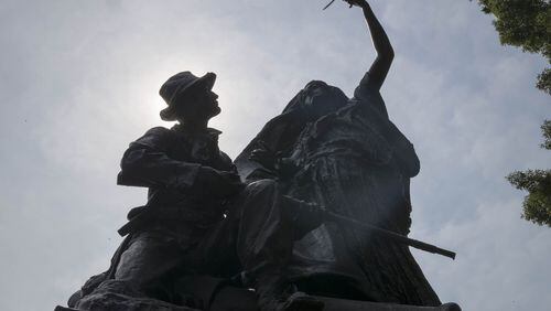 The Peace Monument, which consists of an angel halting the firing of a Confederate soldier’s gun, is located at the 14th Street and Piedmont Avenue entrance of Piedmont park in Atlanta. (ALYSSA POINTER/ALYSSA.POINTER@AJC.COM)